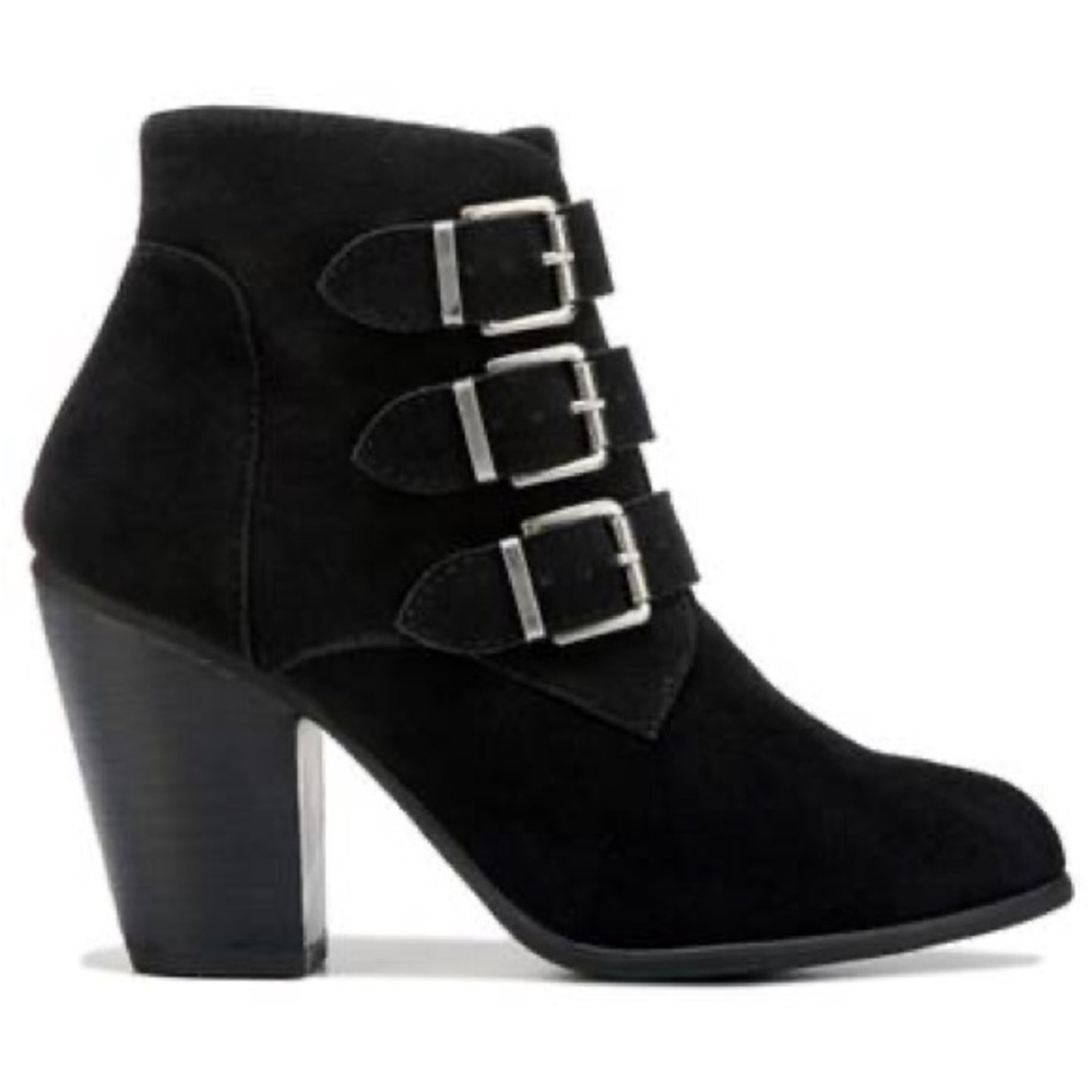 Black buckle bootie XOXO. Excellent condition. Hardly worn. Light wear on soles.